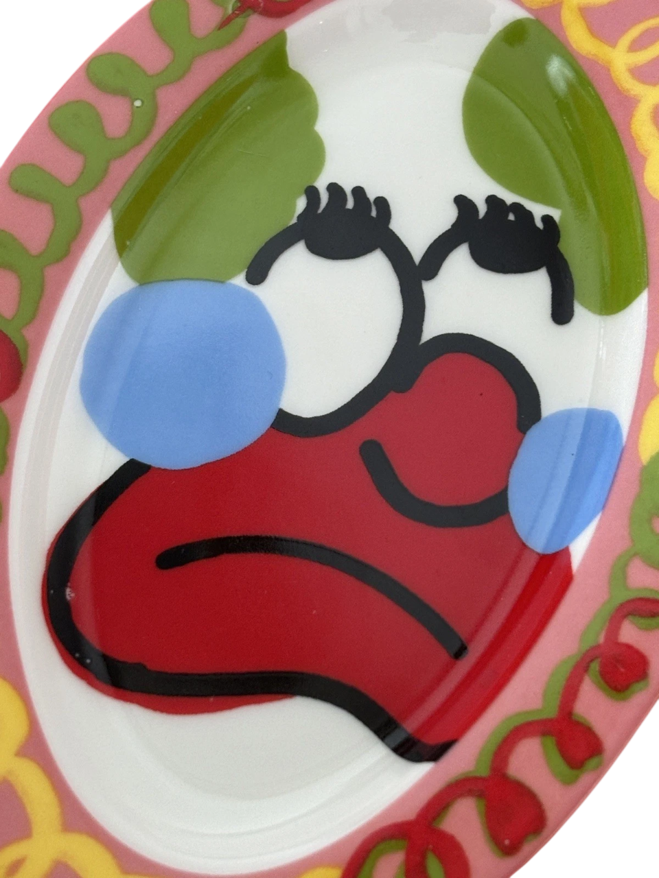 Original hand-painted plate featuring a colorful clown design by SLAWN. Unique art piece for collectors or decor.